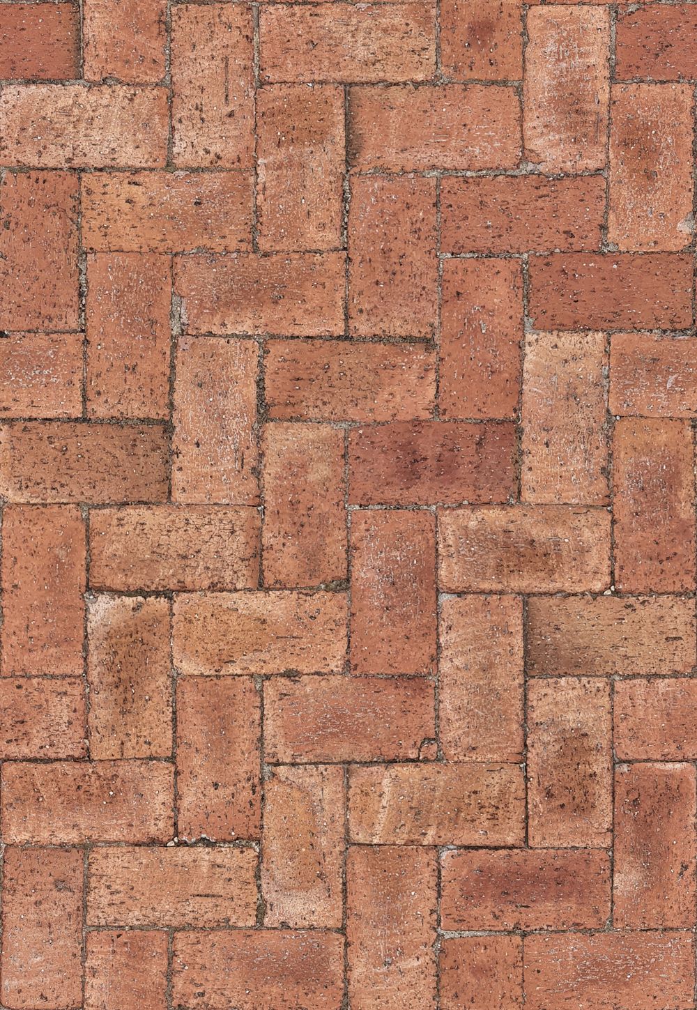 Red herringbone brick paving