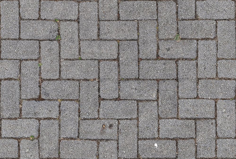 Grey block paving in a basket weave
