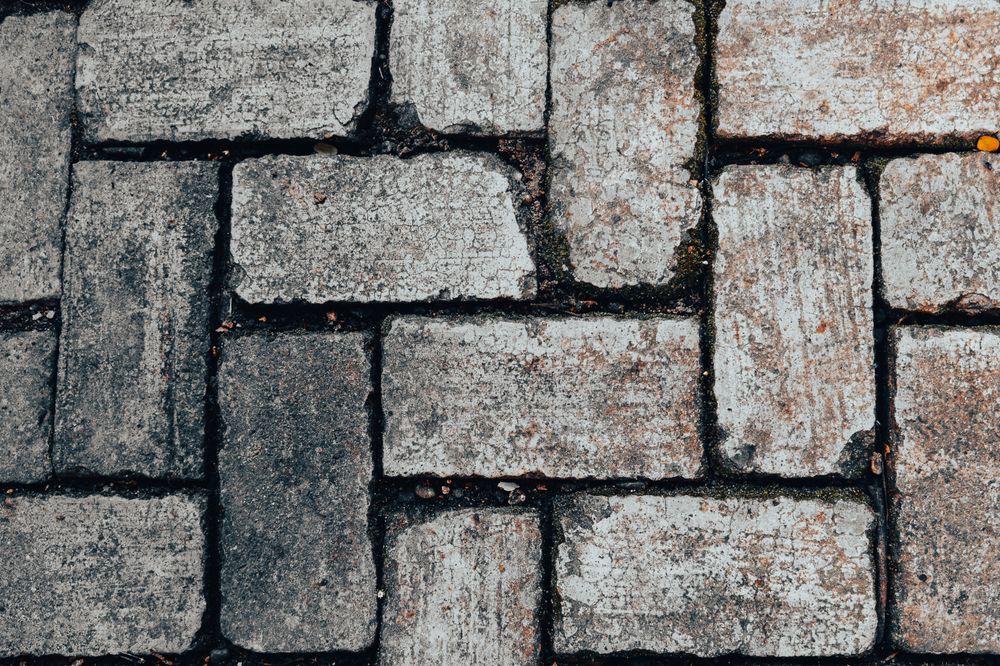 Weathered brick paving close up