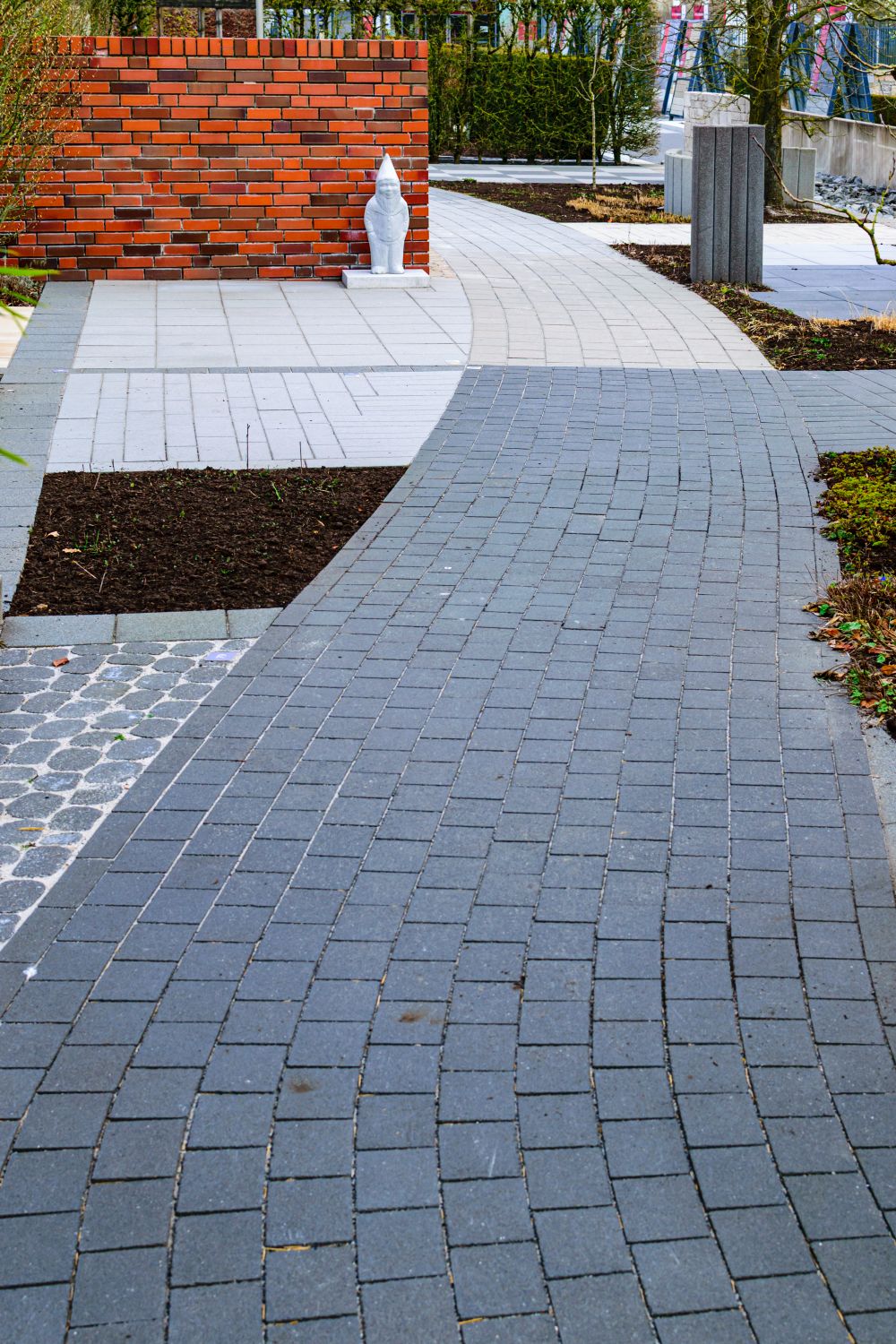 Curved paved path through a garden